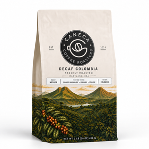 CANECA Decaf Colombia medium roast coffee bag with new illustrated packaging on a white background