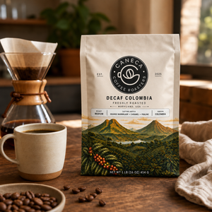 CANECA Decaf Colombia medium roast coffee bag with pour-over brewer and ceramic cup
