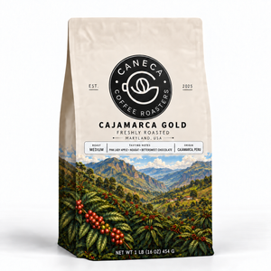 CANECA Cajamarca Gold medium roast coffee in corrected warm-ivory packaging