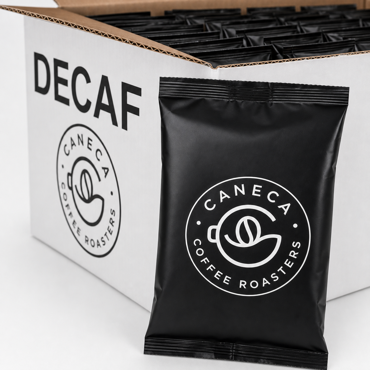 Close-up of a CANECA pre-ground DECAF fractional coffee pack