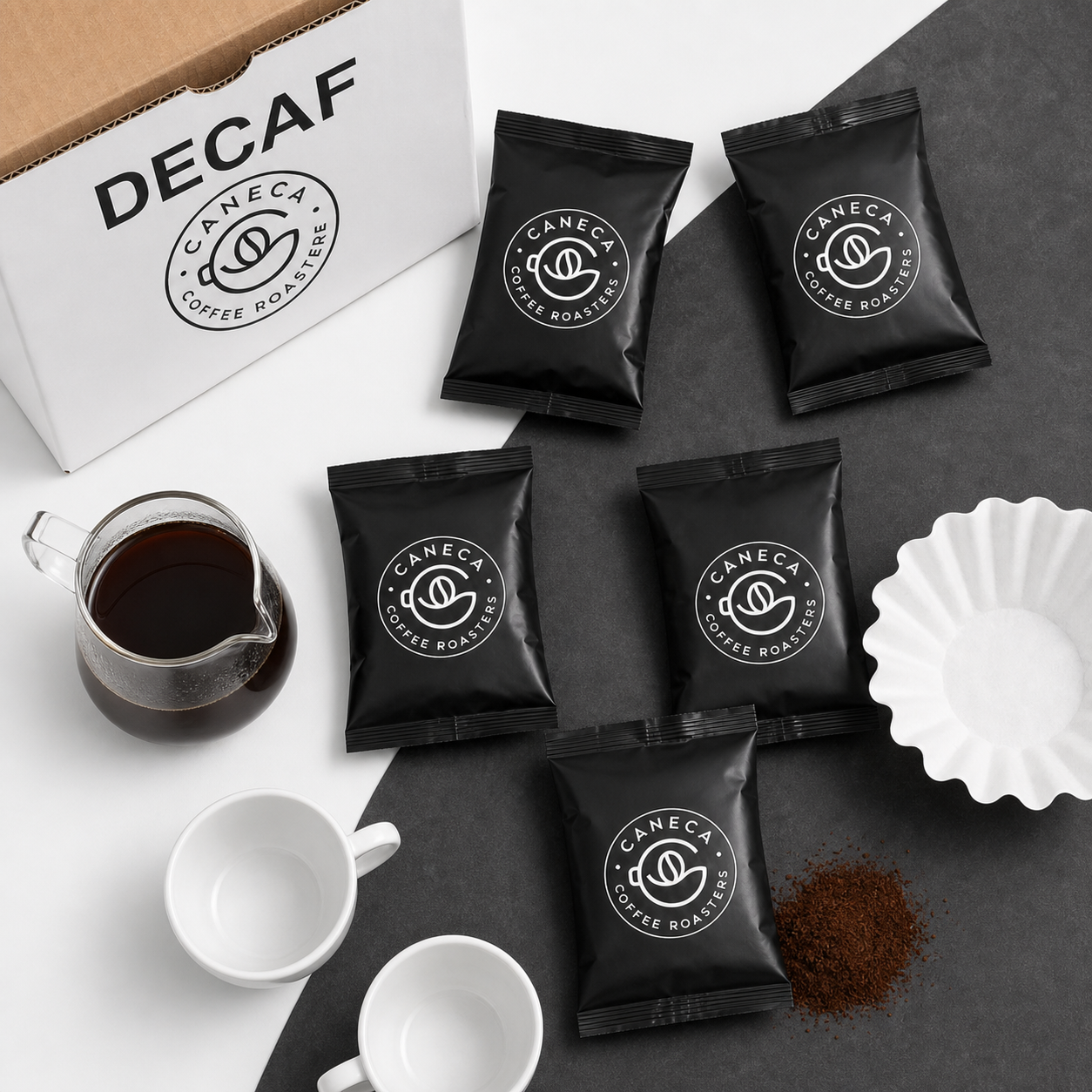 Overhead hospitality flat lay of CANECA DECAF fractional packs and coffee service