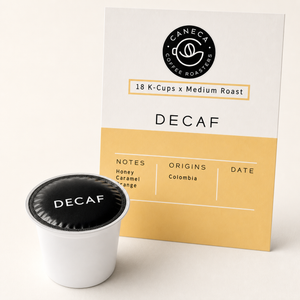 Close-up of a CANECA Decaf medium roast single-serve coffee pod