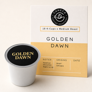 Close-up of a CANECA Golden Dawn medium roast single-serve coffee pod