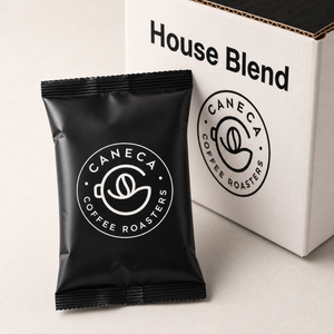Close-up of a CANECA pre-ground House Blend fractional coffee pack
