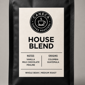 Close-up of the CANECA House Blend medium roast label and matte coffee bag