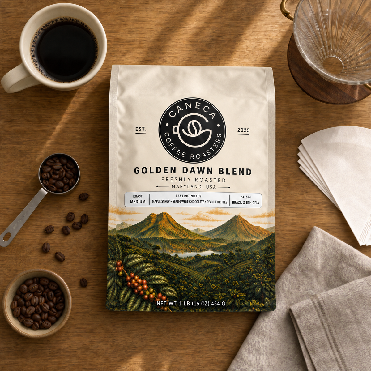 Overhead flat lay of CANECA Golden Dawn Blend medium roast new packaging and brewing tools