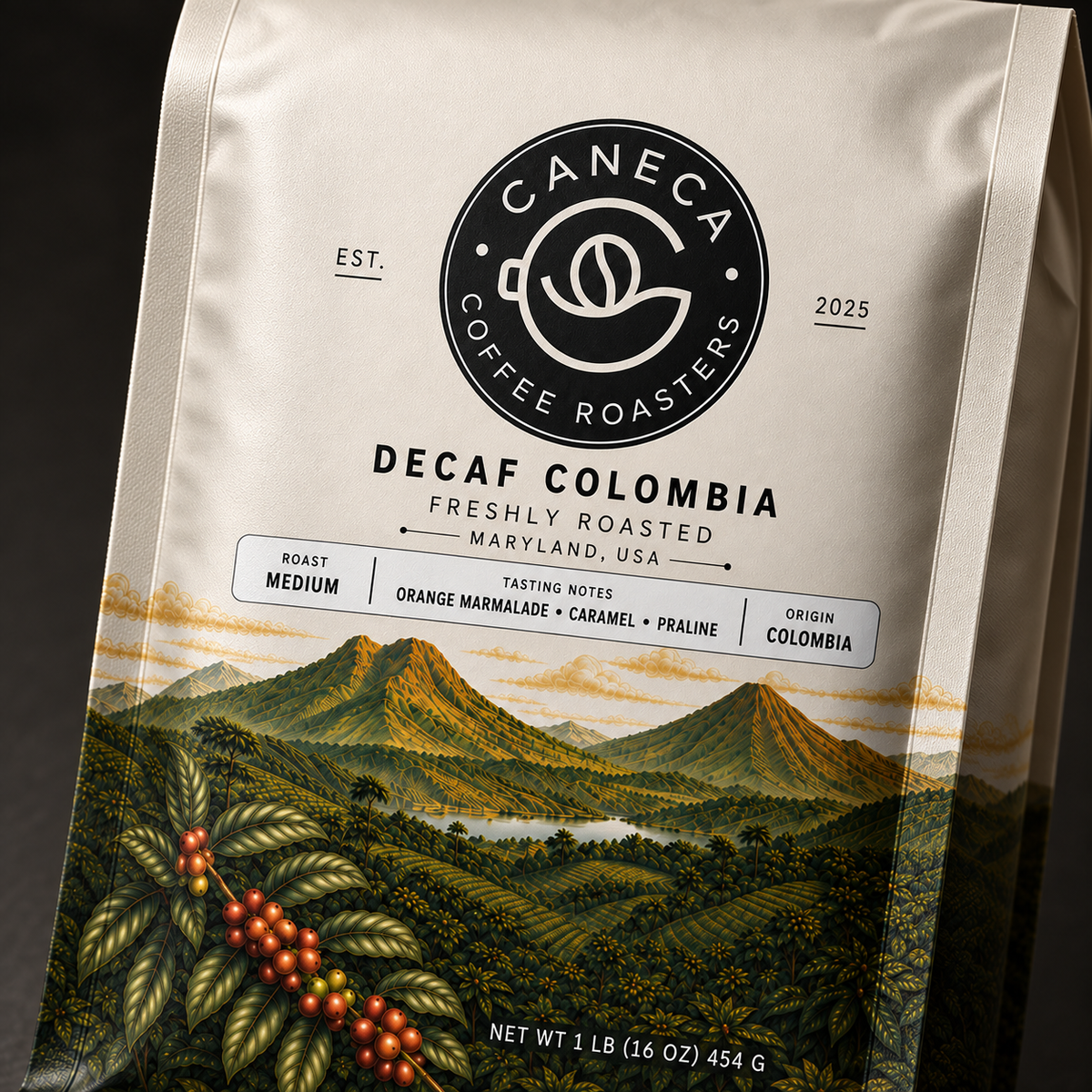 Close-up of the CANECA Decaf Colombia medium roast illustrated coffee bag and product information strip